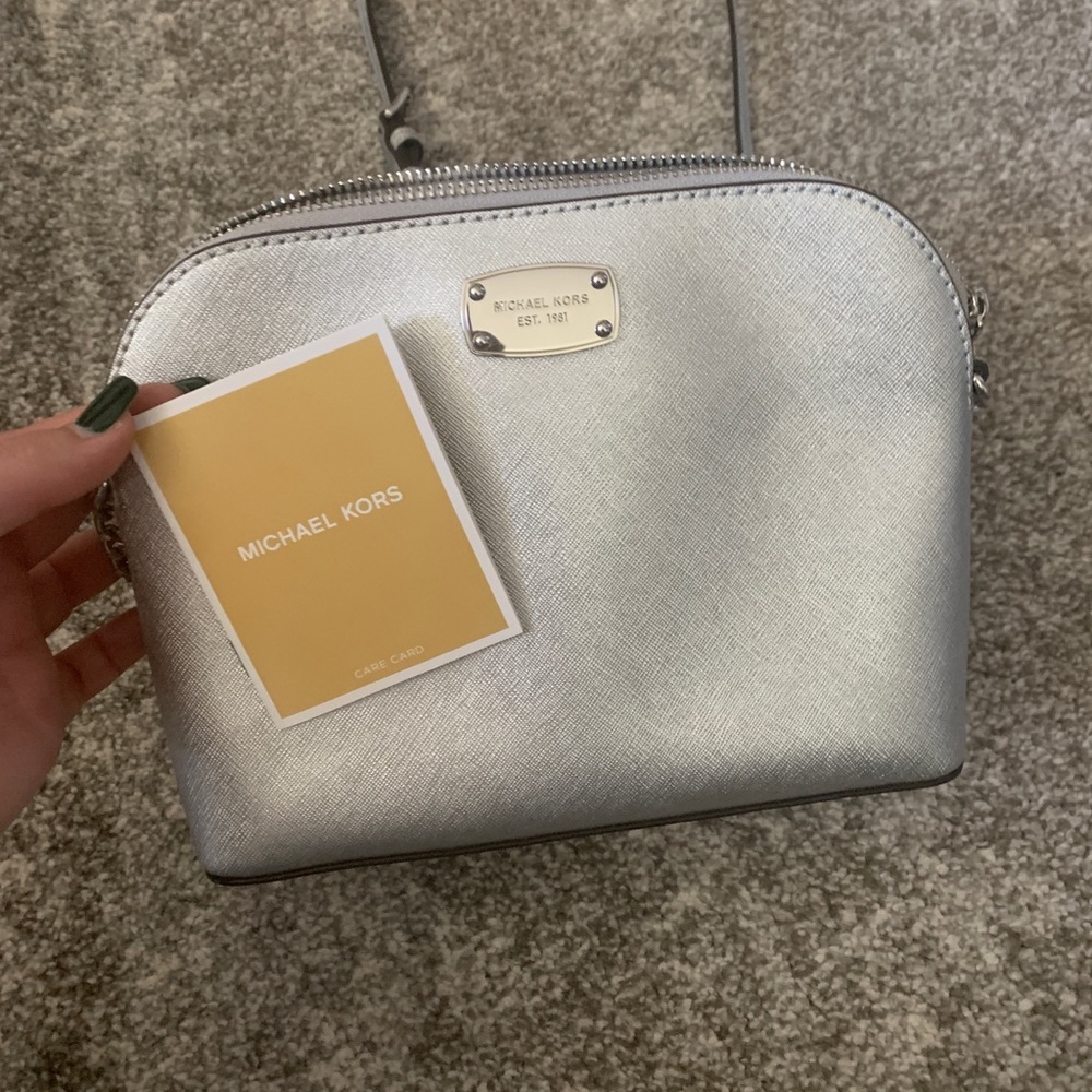 Michael Kors Silver “dome” crossbody